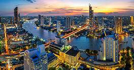 Panorama of the Bangkok skyline at twilight, where the IMF and World Bank annual meeting is being held.