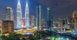 An expanding and diversifying economy is attracting foreign investors to the peninsular nation. Proximity to pricey Singapore helps.