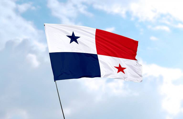 Flag of Panama in front of blue sky