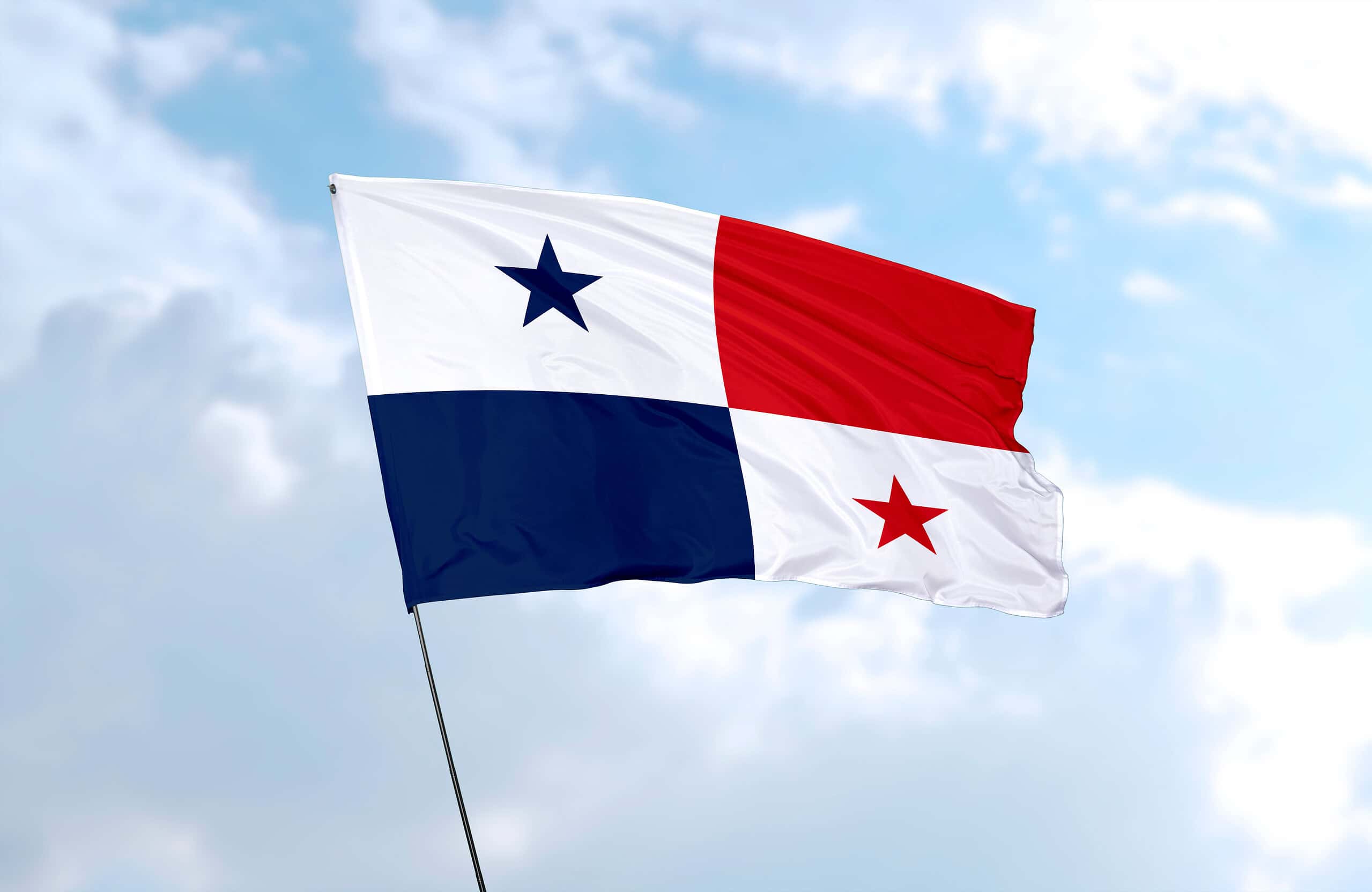 Flag of Panama in front of blue sky