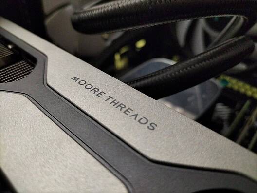 Close-up of the Moore Threads lettering and the S80 graphics card, germany, mecklenburg, rostock, 2023-11-29