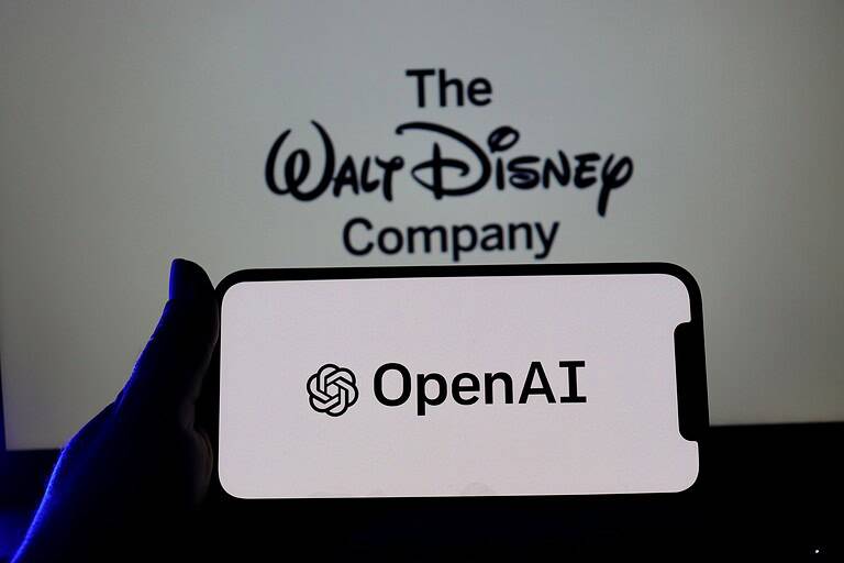 isney logo on smartphone screen with OpenAI logo in the background. The Walt Disney Company and Open AI.