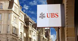 UBS sign on the wall of an UBS office building. UBS is a Swiss global financial services bank, headquartered in the Swiss city of Zurich.