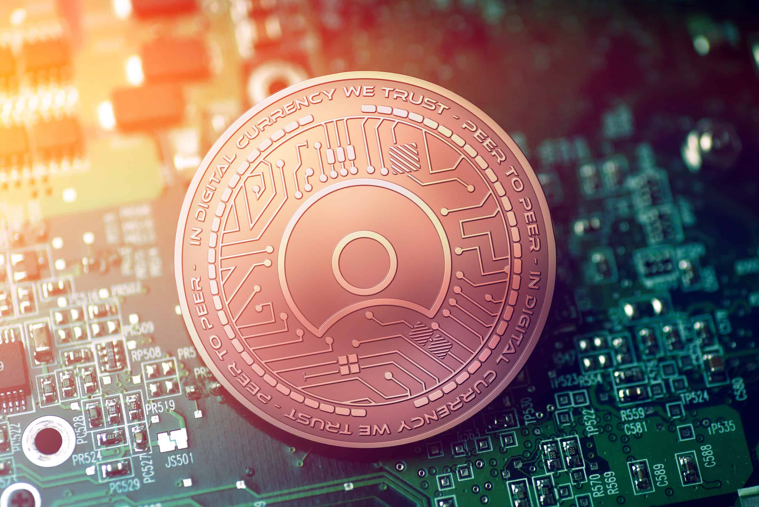 shiny copper SIMPLE TOKEN cryptocurrency coin on blurry motherboard background
