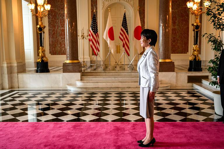 Japan Prime Minister Sanae Takaichi standing in Akasaka Palace in Tokyo.