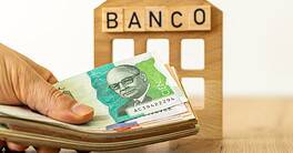 Bank loan in Colombian peso. Financial business concept. Bank symbol, handing cash to customer. Money transfer, Financial operations in Colombia currency. close up