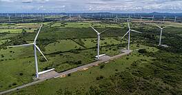 Aerial drone photo of a wind turbines captured in Penonome, Panama. Large wind farm on a sunny day. Clean energy, renewable power, and sustainable development in Latin America.
