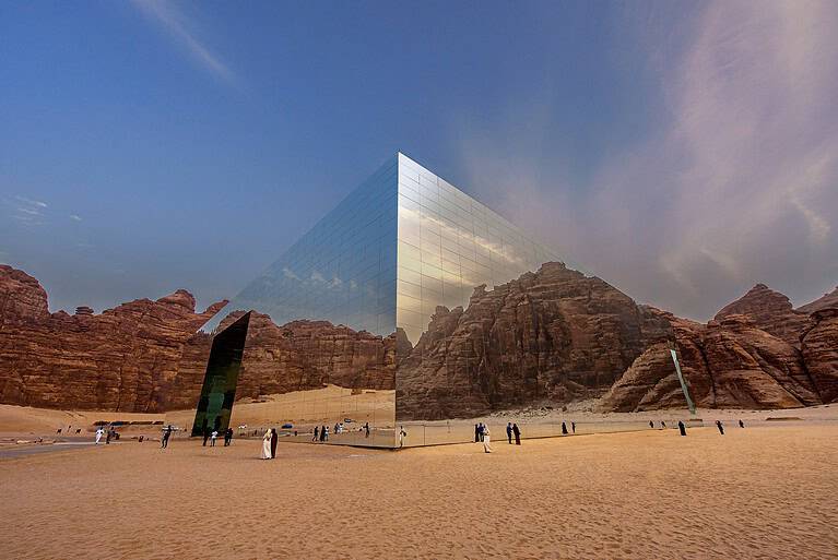 "Maraya:The Mirror of the Desert", Saudi Arabia. Maraya, the world’s largest mirrored building, blends seamlessly into the AlUla desert, reflecting the sky and the majestic rocks of this ancient land