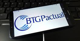 Btg Pactual company logo displayed on mobile phone