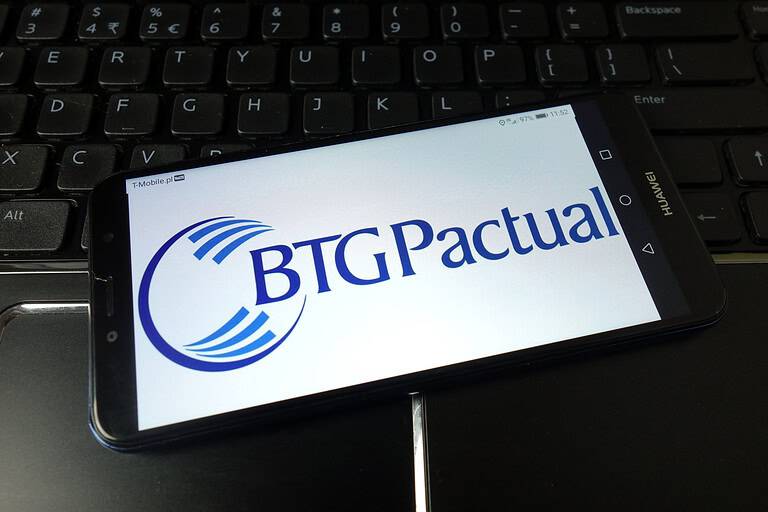 Btg Pactual company logo displayed on mobile phone
