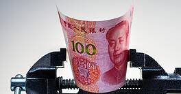 Chinese economy crisis. Pressing on yuan banknote. Inflation, restrictions in China. Yuan money under pressure.