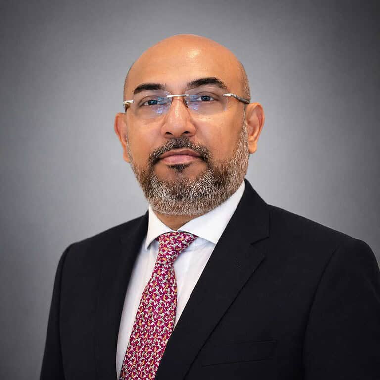 Gautam Anand in formal attire for portrait