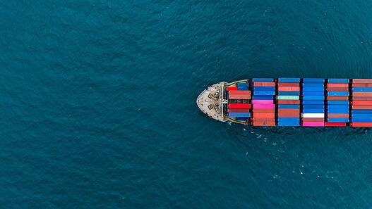 Aerial view of container cargo ship at sea