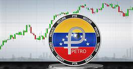 Venezuela Petro digital currency coin with stock market graph background.