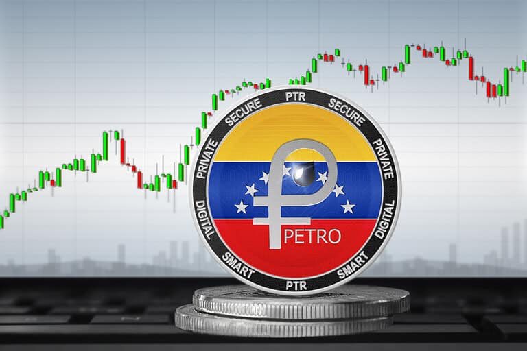 Venezuela Petro digital currency coin with stock market graph background.
