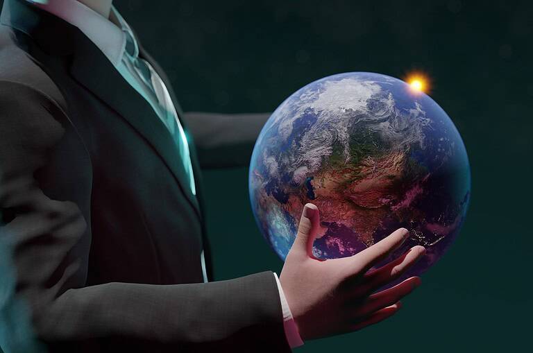 Business professional holding Earth with sunrise, global finance concept.