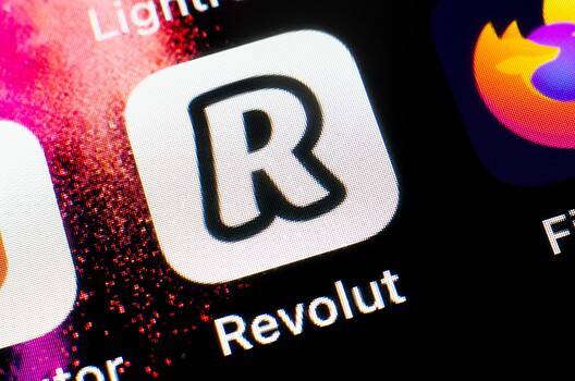 Revolut app icon on smartphone screen for digital banking and finance.