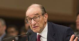 Alan Greenspan speaking at a congressional hearing about economic policy.