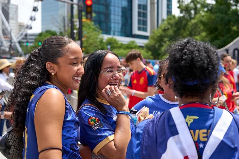 FIFA World Cup 2026 fans wearing Spain and Cape Verde colors gather near the Olympic Rings at Centennial Olympic Park before the match in Atlanta.