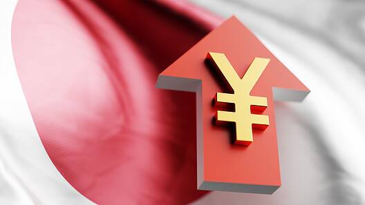 Red arrow with Yen symbol pointing upward, symbolizing financial growth.