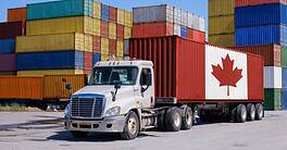 A Canada-marked shipping container on a truck, illustrating Canadian international trade - Montage