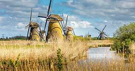 Kinderdijk, Netherlands - April 20, 2024: Kinderdijk, a village in the Netherlands, is famous for its iconic windmills built in the 18th century