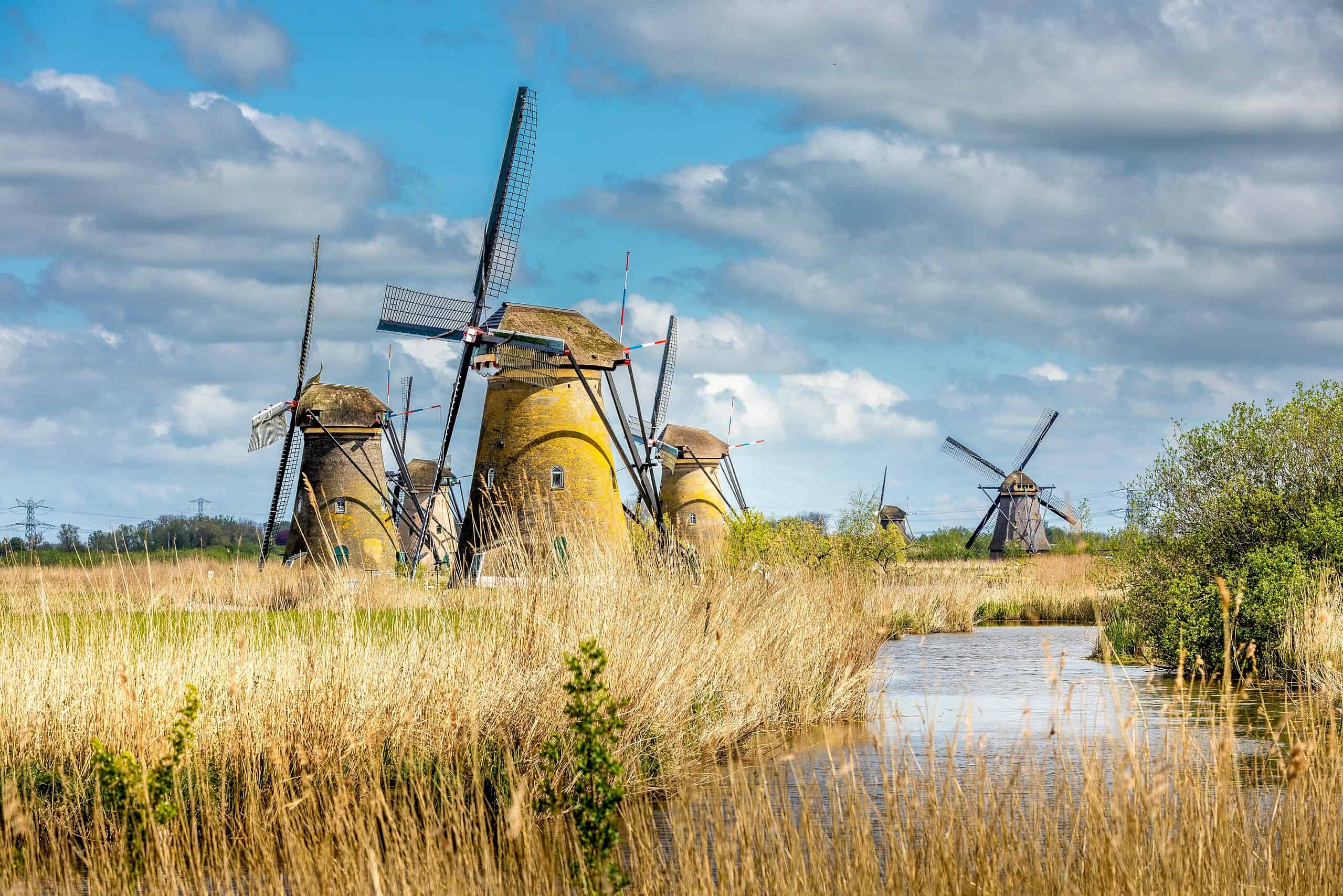 Kinderdijk, Netherlands - April 20, 2024: Kinderdijk, a village in the Netherlands, is famous for its iconic windmills built in the 18th century