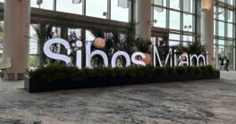 Sibos 2026 conference entrance sign in Miami Beach.