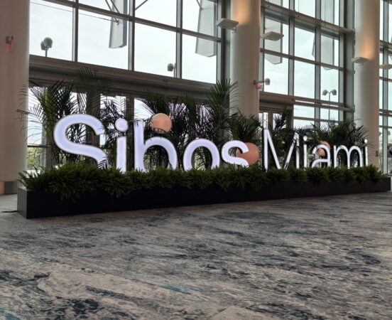 Sibos 2026 conference entrance sign in Miami Beach.