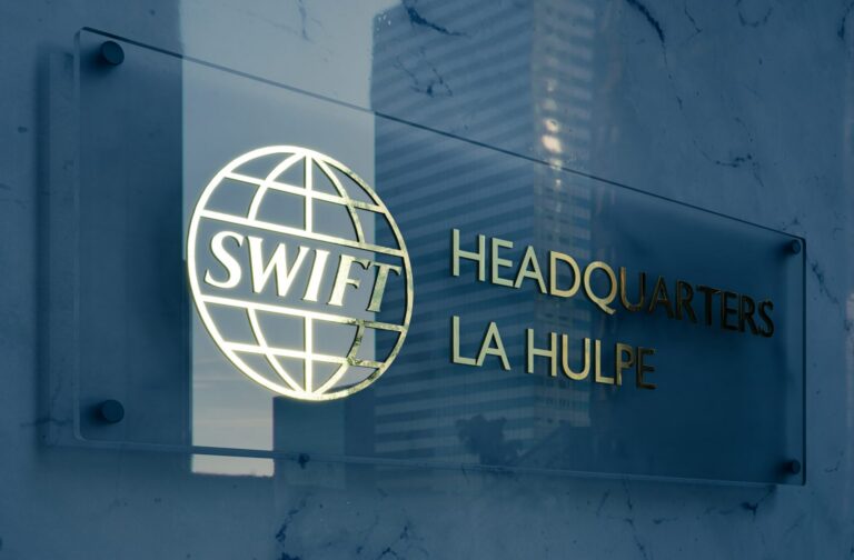 Swift building in France with group's logo on the sign.