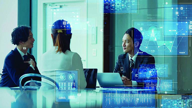 Group of business people meeting with digital technology