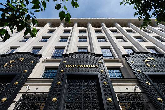 BNP Paribas building exterior with ornate gates and logo.