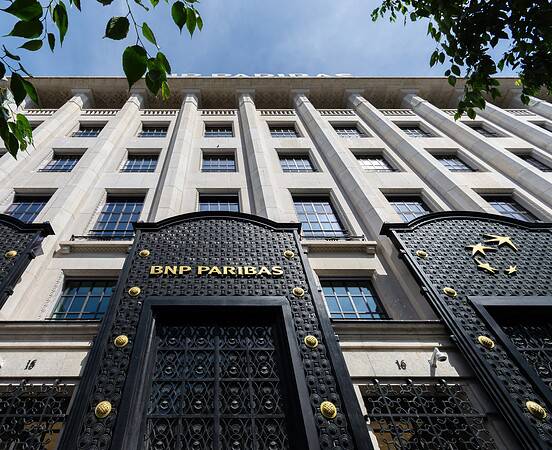 BNP Paribas building exterior with ornate gates and logo.