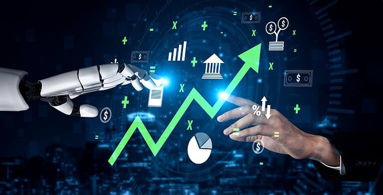 Human and robot hands pointing to a rising financial growth graph.